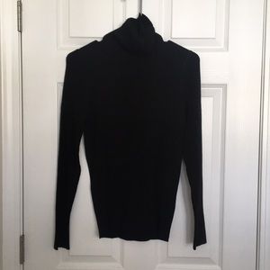 Black stretchy turtleneck. Size: L